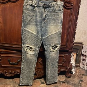 Stacked skinny jeans with rips